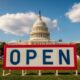 A photo of the U.S. Capitol building with a large "OPEN" sign in front, symbolizing the end of the longest government shutdown.